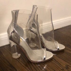 Clear boots with crystal heel